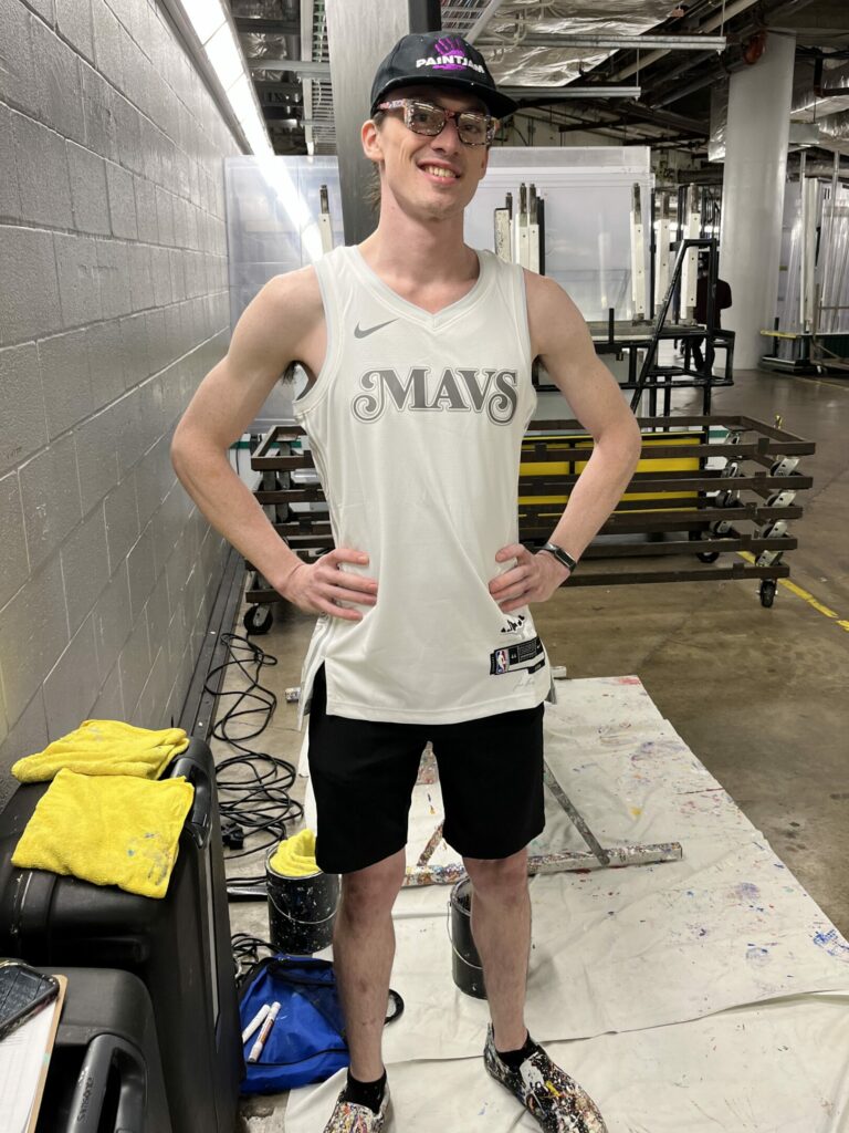 Harvey Dunn backstage at the American Airlines Center ready to perform for a halftime show for the Dalla Mavericks